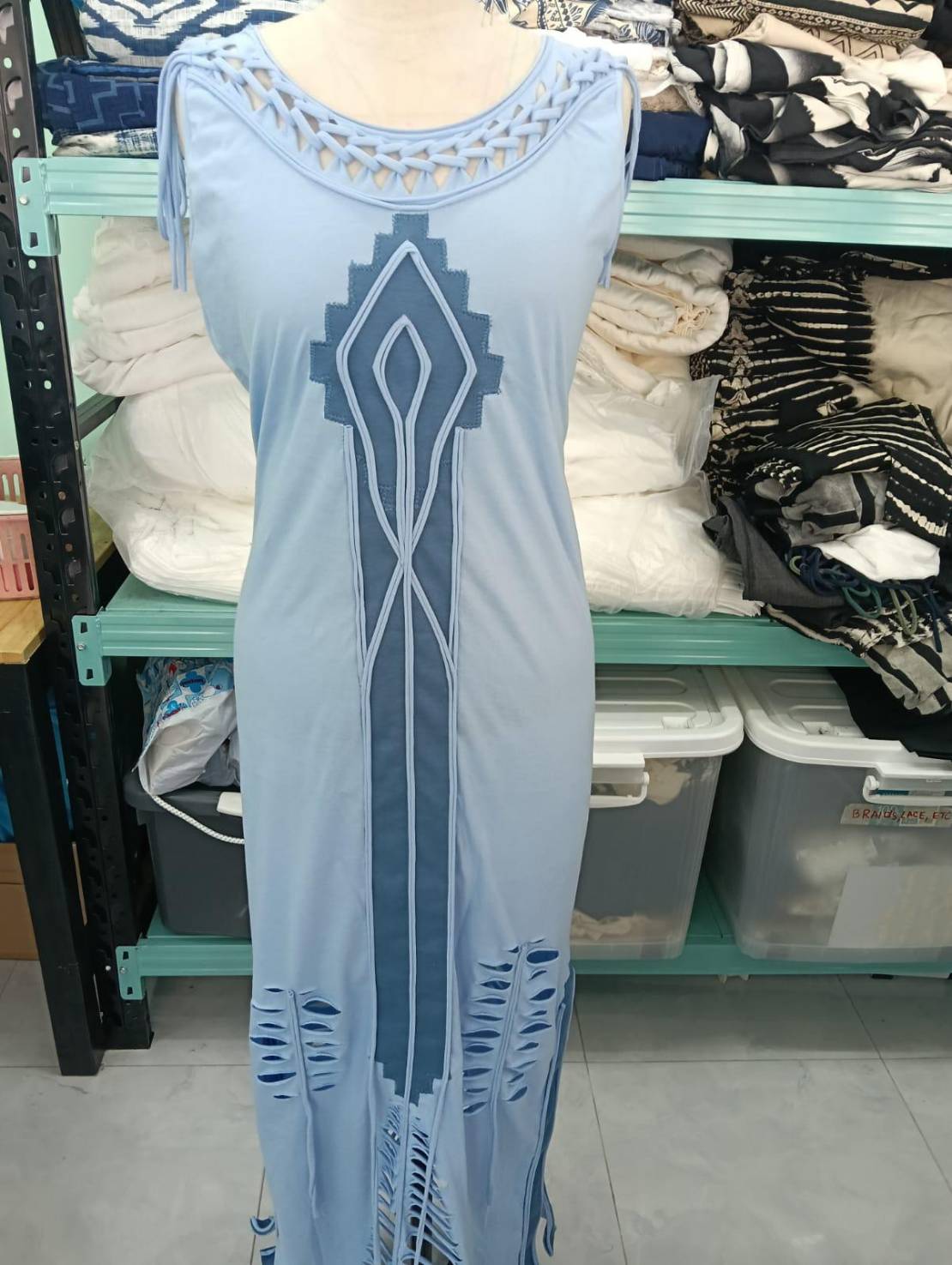 TOTEM DRESS An elegant sleeveless maxi dress with side slits, inspired by ethnic motifs. Handcrafted symmetrical applique in contrasting color. Made from 100% cotton, a lightweight knit fabric. BestPlanNoPlan Blue